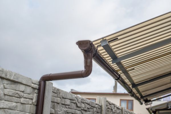 Plastic Downspout Installation in Louisburg